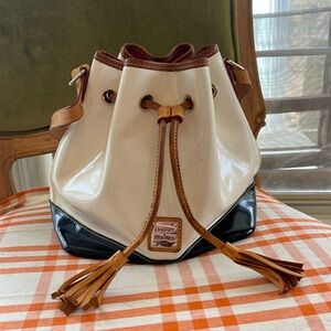 Authentic Dooney and Bourke drawstring large handbag. Patton leather gently worn